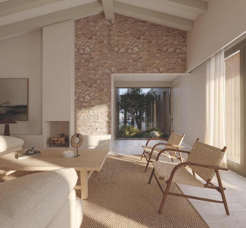 Salón con muro de piedra y butacas de tejido